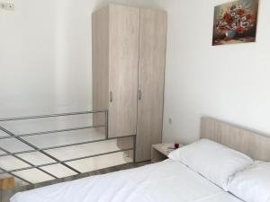 Posteľ alebo postele v izbe v ubytovaní House Mima