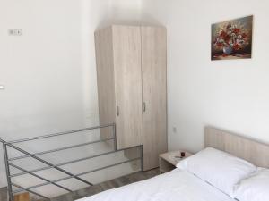 Posteľ alebo postele v izbe v ubytovaní House Mima