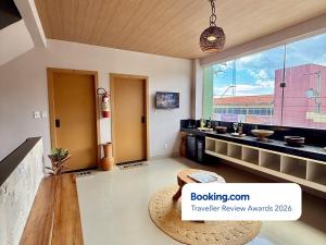 a large room with a large window and a sink at Your Home - Studios Boutique Hotel in São Luís +55 photos
