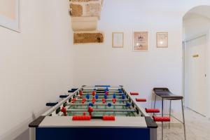 a pool table with red and blue balls on it at Melodia del Salento - Lecce Selection in Surbo