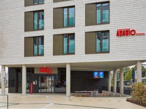 a building with the entrance to an office building at Aparthotel Adagio Heidelberg in Heidelberg