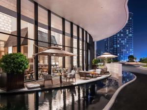 a rendering of a hotel patio with tables and chairs at Pullman Quanzhou Shuitou in Quanzhou