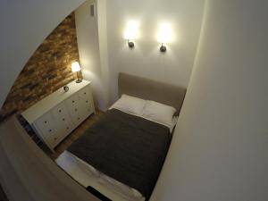 Postel nebo postele na pokoji v ubytování Studio Polanica