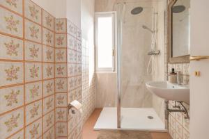 a bathroom with a shower and a sink at Allegria in Baiardo +68 photos