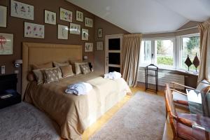 Кровать или кровати в номере Villa Tiffany