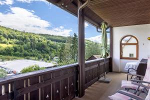 a balcony with a view of a mountain at Lina's Rhön in Bad Brückenau