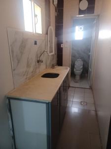 a bathroom with a sink and a toilet at مؤسسة علي عايض سداح الدوسري للمقاولات in Abu Arish +46 photos