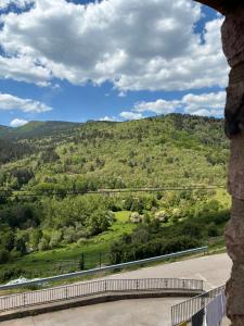 a view of a mountain from a window at Casa Rural Senderismo in Lumbreras