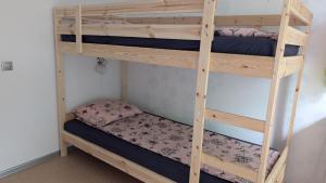a couple of bunk beds in a room at Celtnieku 8 in Ventspils