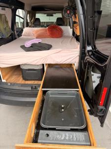 two beds in the back of a van at Caddy Car in Brisbane