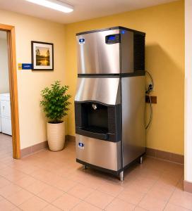 a large stainless steel oven in a room at Days Inn by Wyndham Hinckley in Hinckley
