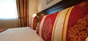 Letto o letti in una camera di Hotel Calissano
