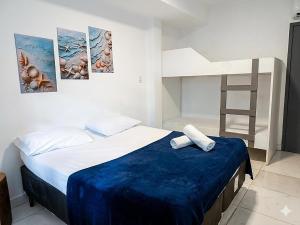 a bedroom with a bed and a bunk bed at REF House Barra Da Tijuca in Rio de Janeiro +44 photos