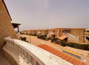 a view from the balcony of a building at Dina Mansour's vacation home 54 A upper in Dawwār ‘Abd Allāh
