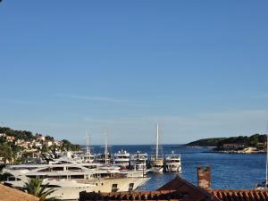 a bunch of boats are docked in a harbor at Hvar old Town Boutique in Hvar +11 photos