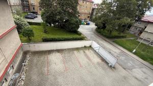 an aerial view of a parking lot on a building at Šturka Apartment in Martin