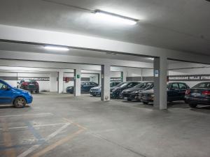 a parking garage filled with lots of parked cars at Hotel Santa Chiara in Nocera Inferiore