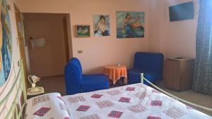 Postel nebo postele na pokoji v ubytování Azienda Agrituristica Piccolo Ranch