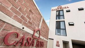 a sign on the side of a santa rosa building at Casa Rosa in Aguascalientes