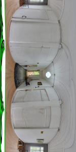 an overhead view of a ceiling in a room at odahouse. fireplace and spring water. in Batumi