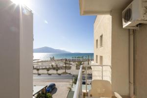 a view of the beach from a balcony of a building at Hotel Bella Vista in Orikum