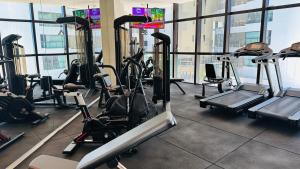 a gym with a bunch of exercise bikes in it at Beach Class Internacional Transamerica in Recife