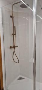 a shower with a glass door in a bathroom at Devesa Park in Playa de Gandia +22 photos