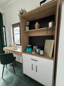an office with a desk and a chair at Beach Bungalows Costinesti in Costinesti
