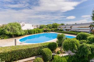 an overhead view of a swimming pool with trees and bushes at Maréa - Boutique Stay in Torre a Mare