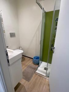 a bathroom with a sink and a shower at La terrazza in Varazze