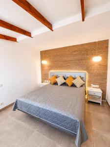 a bedroom with a large bed in a room at Veiw Luxury Apartment in Adeje +55 photos