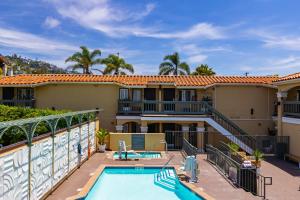 a view of a house with a swimming pool at The Mara Laguna Beach, an AvantStay Hotel in Laguna Beach