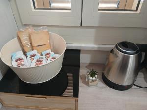 a blender sitting on a table next to a coffee maker at Dolcecasa in Misilmeri