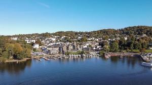 an aerial view of a town on a river at Victoria Loft - 1 Bedroom Apartment with off site spa access in Bowness-on-Windermere