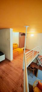 a living room with a bunk bed and a ladder at Apartman - Jacuzzi Spa - Tvrđava Travnik in Travnik