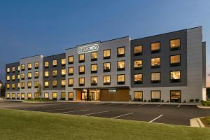 a rendering of the sheraton syracuse hotel at StudioRes by Marriott Leland in Leland