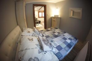 Posteľ alebo postele v izbe v ubytovaní Góralska Osada Karpacz - Apartametny