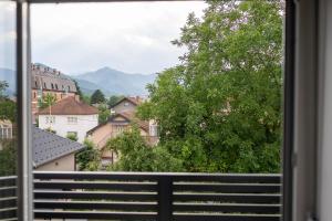 a view of a city from a window at Modern Studio Apartment in Žepče