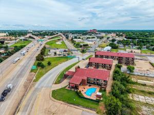an aerial view of a city with a road at The Lodge at the Falls in Wichita Falls