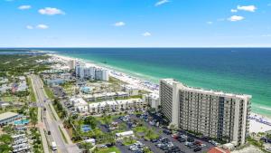 an aerial view of the beach and the ocean at Beachfront Breeze by AvantStay in Panama City Beach