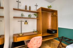 a room with a desk and a chair at Casa Altata Hotel Boutique in Mexico City +62 photos