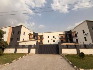 a row of apartment buildings with a gate at Luxury 3 Bedroom Duplex Service Aparment in Abuja in Abuja
