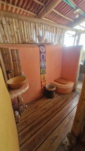 a bathroom with a toilet and a sink in a room at Ecologic Mountain Cabin, amazing view in Santa Marta