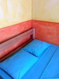 Hostel Iguana Azul tesisinde bir odada yatak veya yataklar