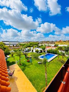 an overhead view of a park with a swimming pool at Luxury Villa with Pool & Garden5km from Cabo in Tétouan