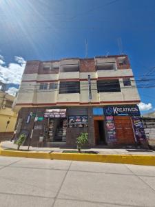 a building on the corner of a street at Samaykuy Bed and Breakfast in Urubamba