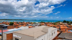 a view of a city and the water at Made Hotel in São Luís