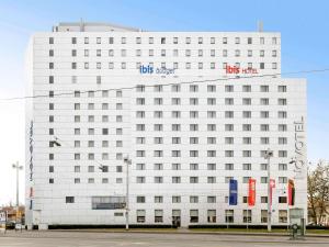 a big white building with a lot of windows at ibis Bern Expo in Bern