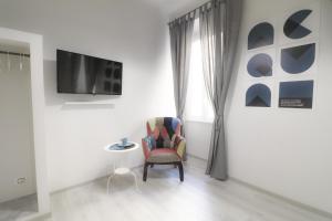 Televízia a/alebo spoločenská miestnosť v ubytovaní Cinque Sogni