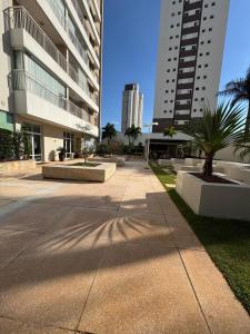 a sidewalk in the middle of a city with buildings at Casa Luna in Americana